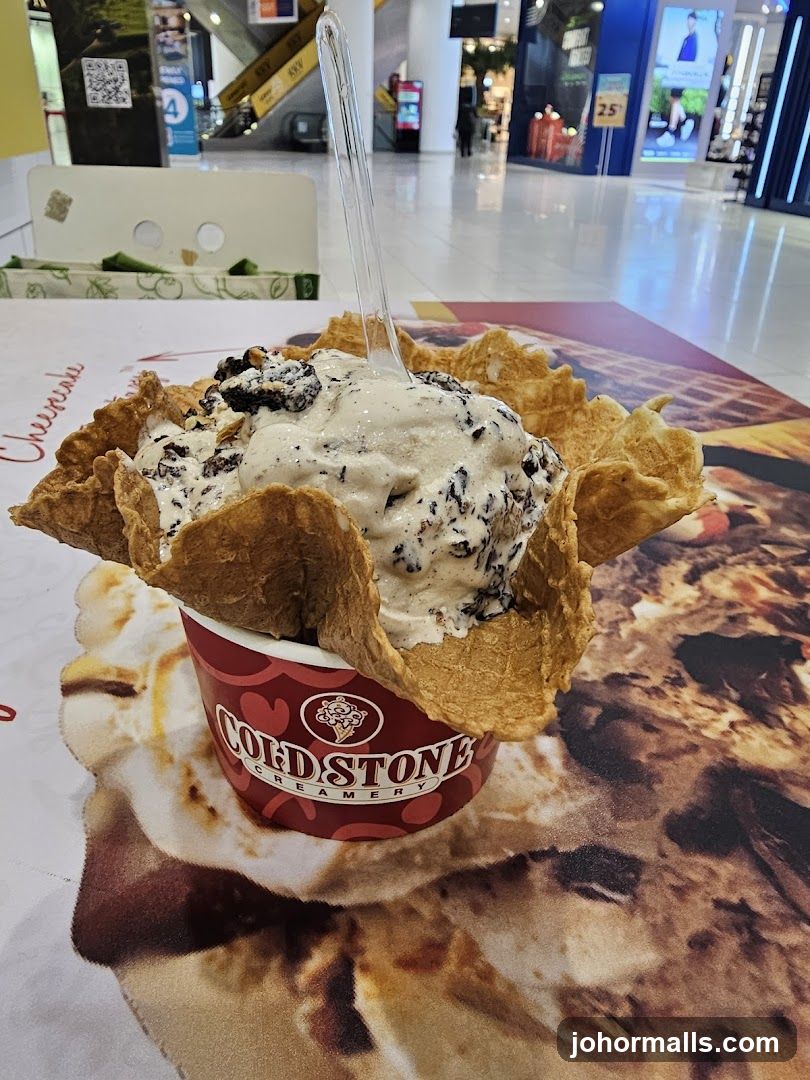 Ice cream in a waffle cone cup