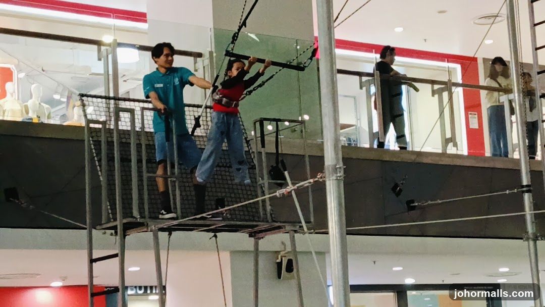 Trapeze activity in a mall
