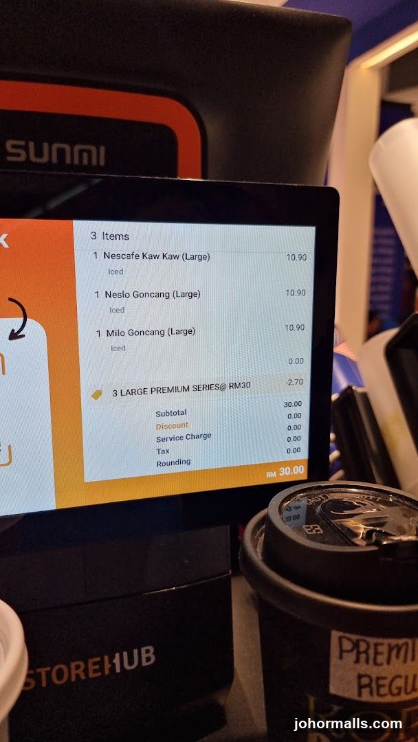 POS Screen and Coffee Cup