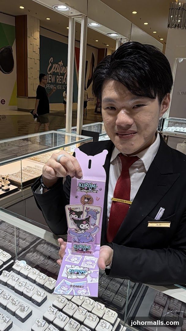 Man holding Kuromi merchandise
