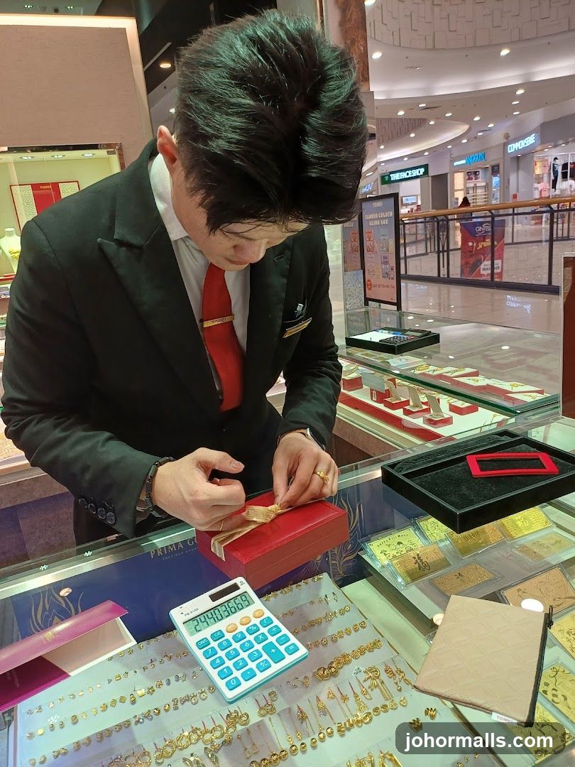 Jewelry Store Employee Wrapping a Gift
