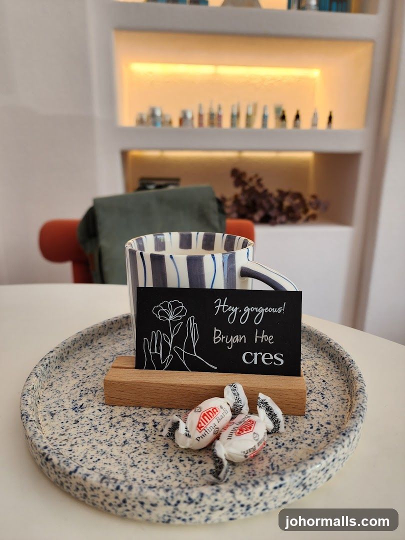 Business card with candy and mug