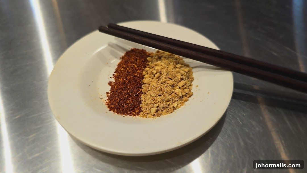 Chili Flakes and Crushed Peanuts with Chopsticks