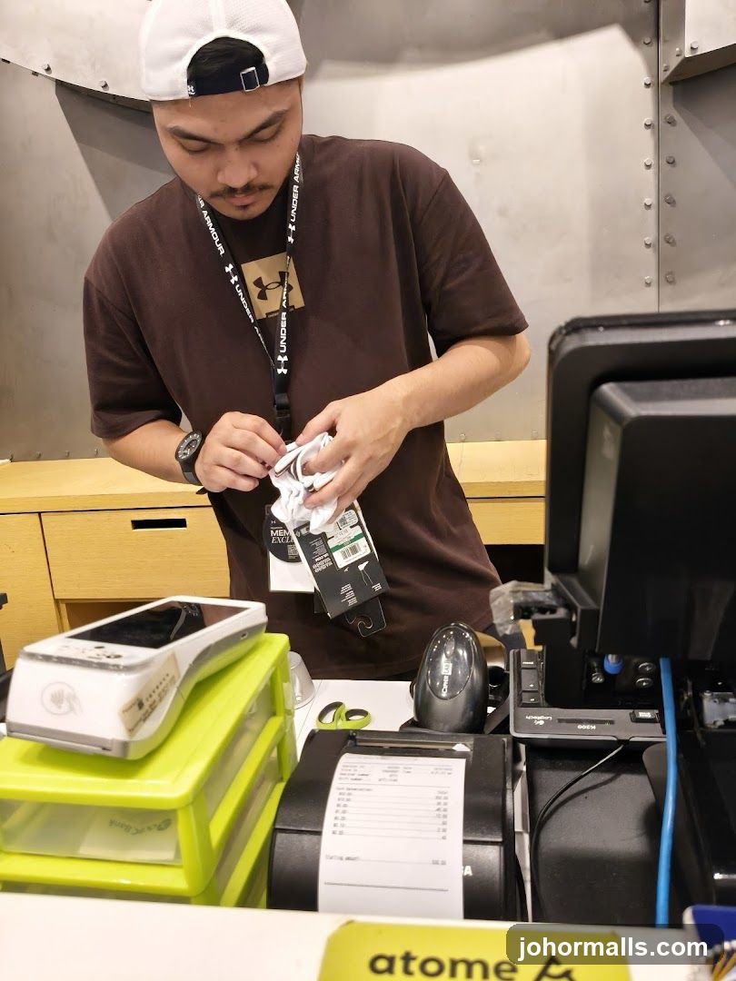 Cashier preparing items at checkout