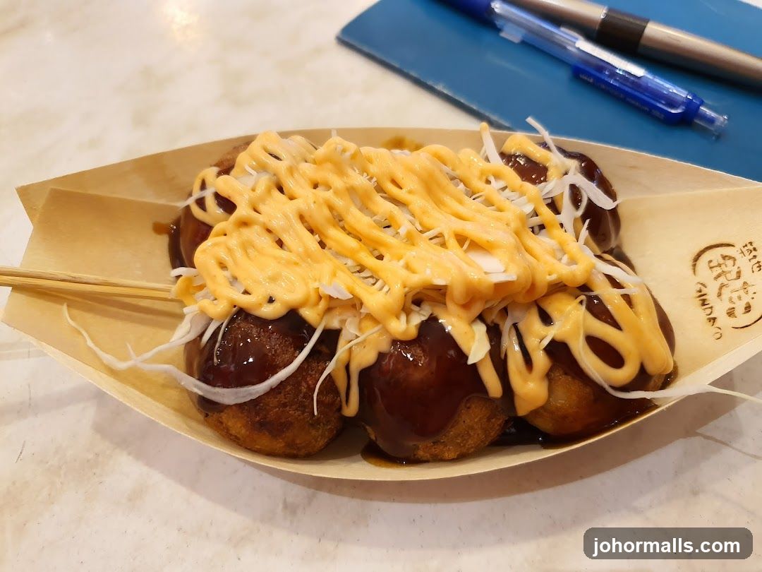 Takoyaki with sauce and toppings