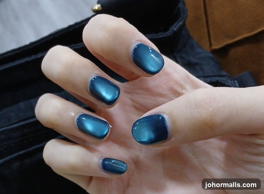 Nails with Teal Polish