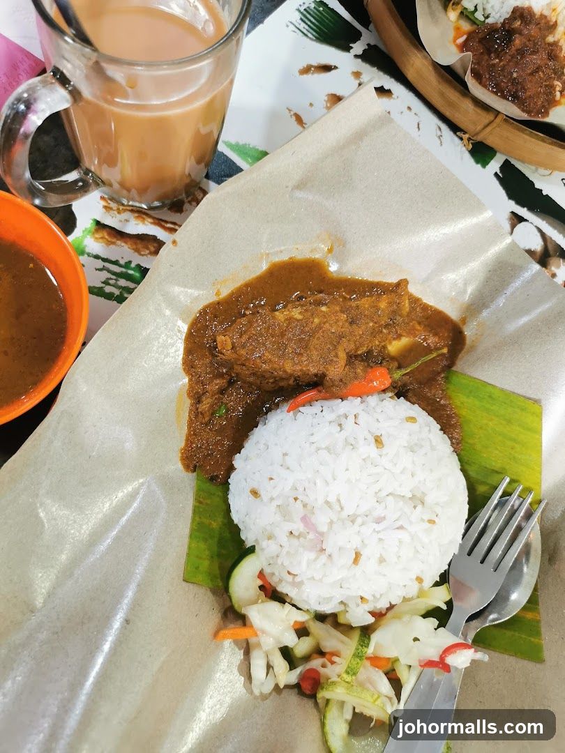 Rice dish with meat and a drink