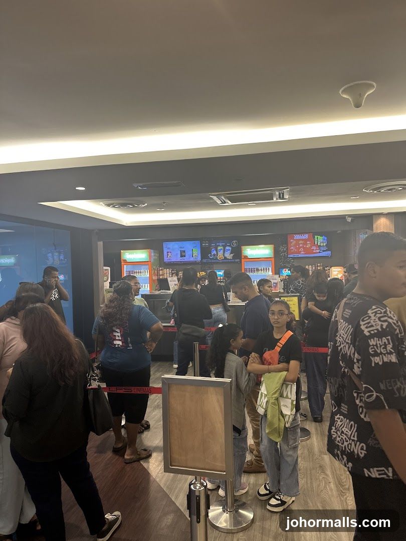 People Queueing at Cinema Concession Stand