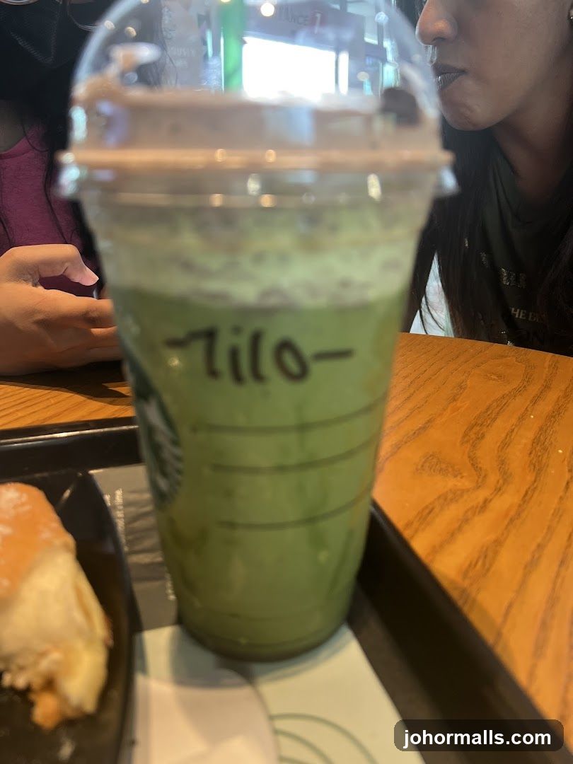 Green Drink with Name Written on Cup