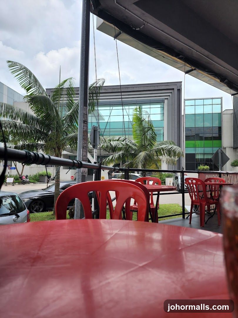Outdoor Seating Area with Modern Buildings in Background