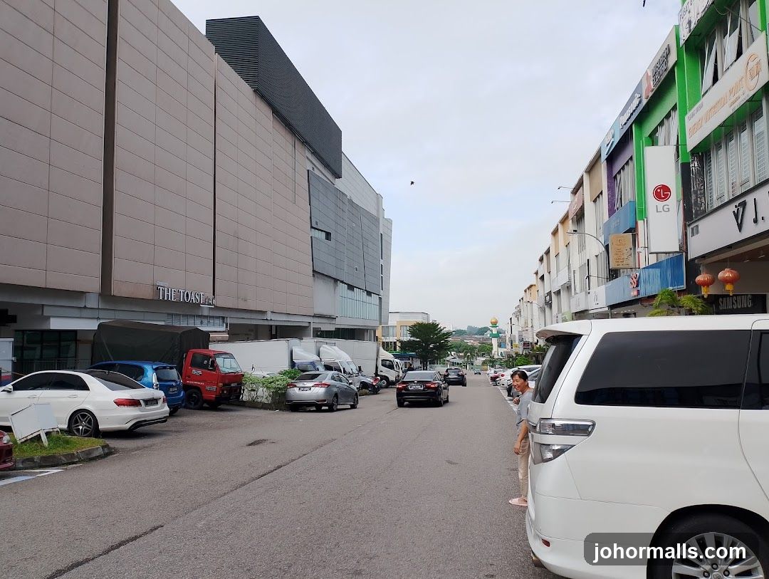 Street view with shops and cars