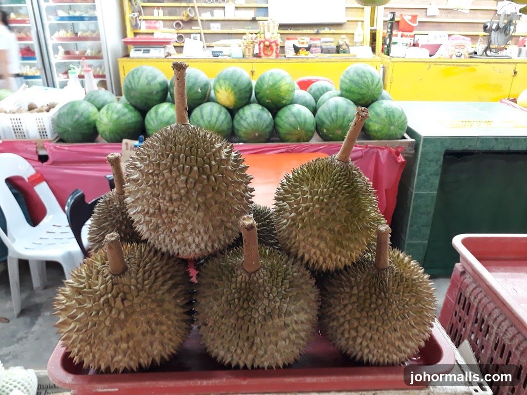 Durians and Watermelons at a Market Stall