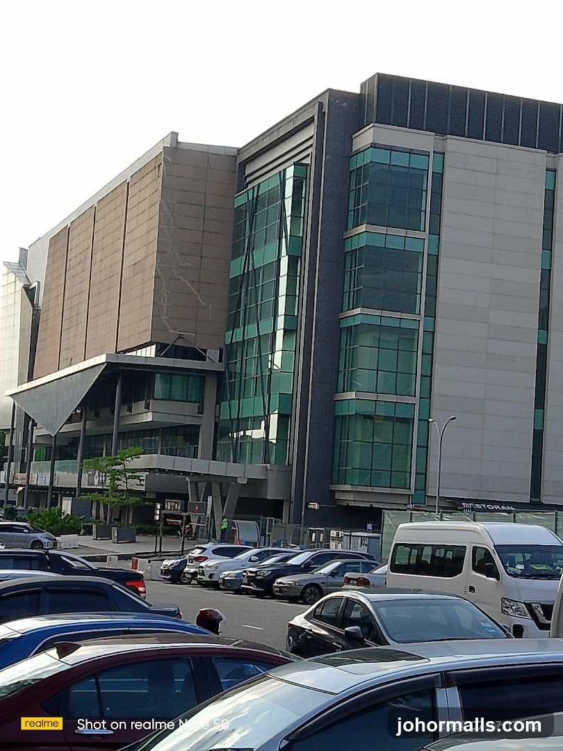 Modern Building Facade with Cars