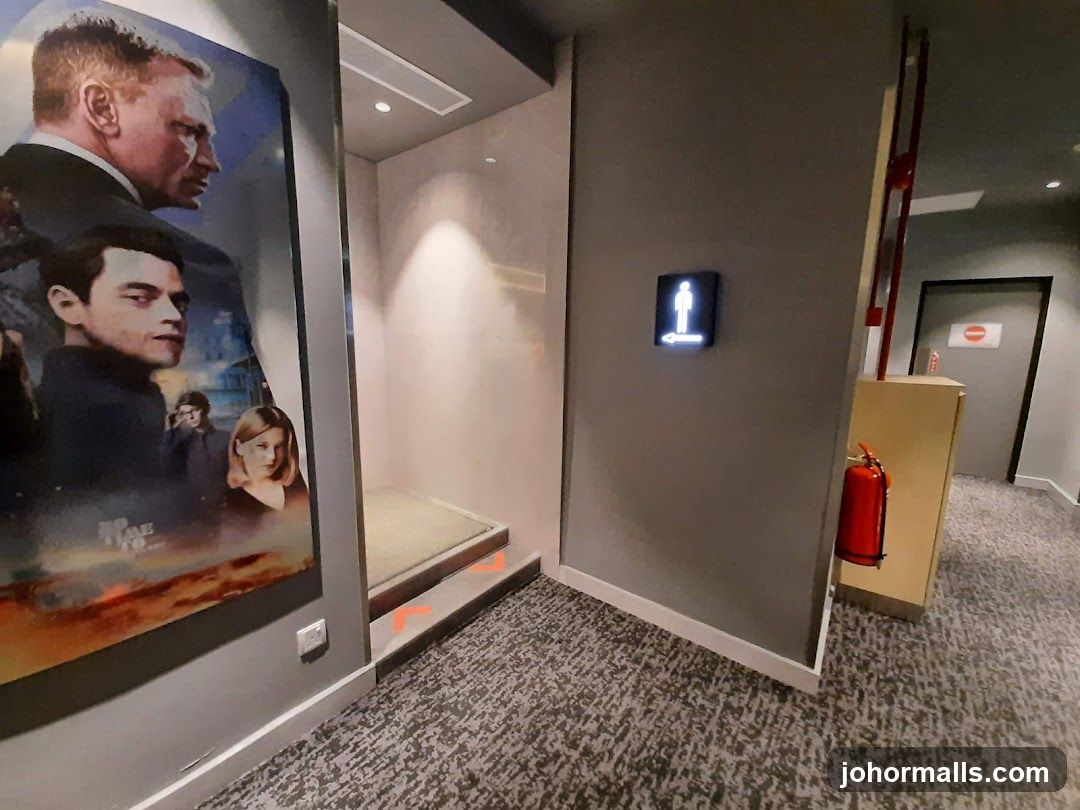 Hallway with Movie Poster and Fire Extinguisher