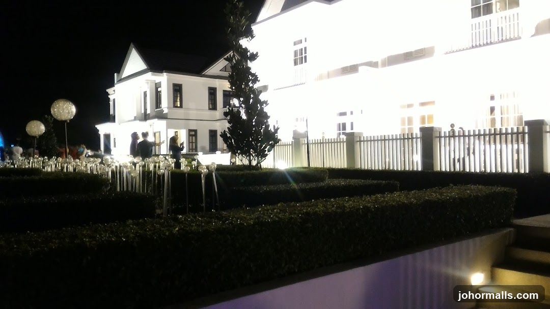 Nighttime exterior of a building with decorative lighting