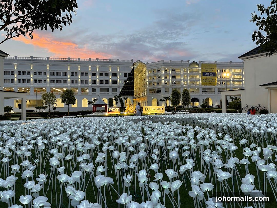Illuminated Flower Field with Buildings