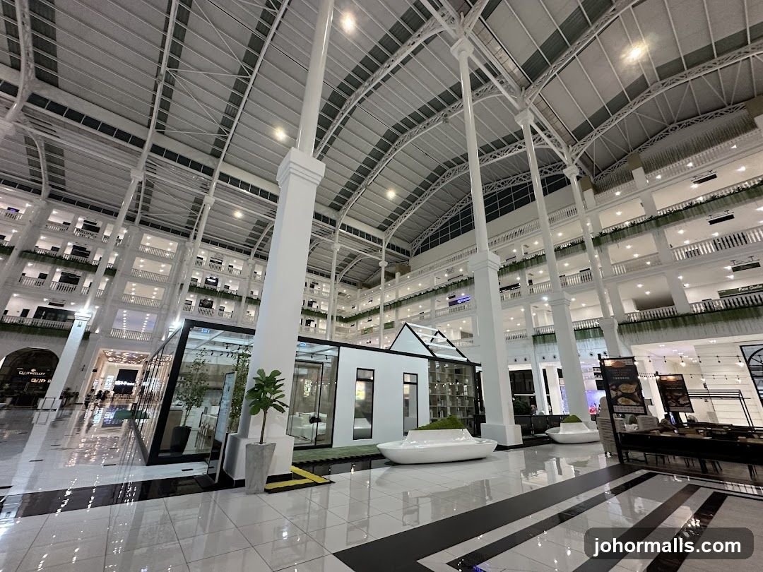 Interior of a large, multi-story atrium with a modern design