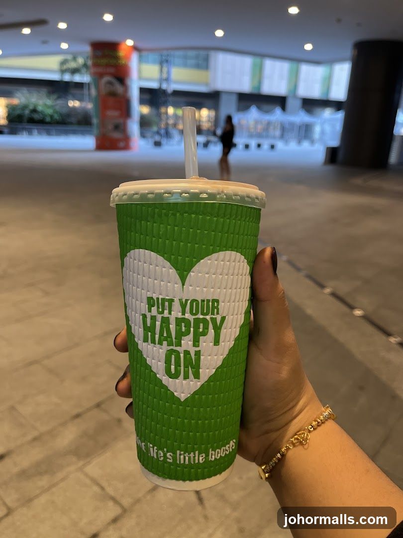 Green cup with text
