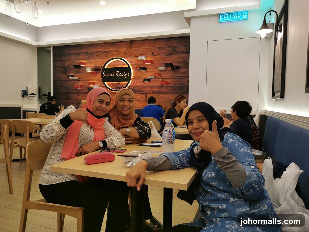 People enjoying a meal at Secret Recipe