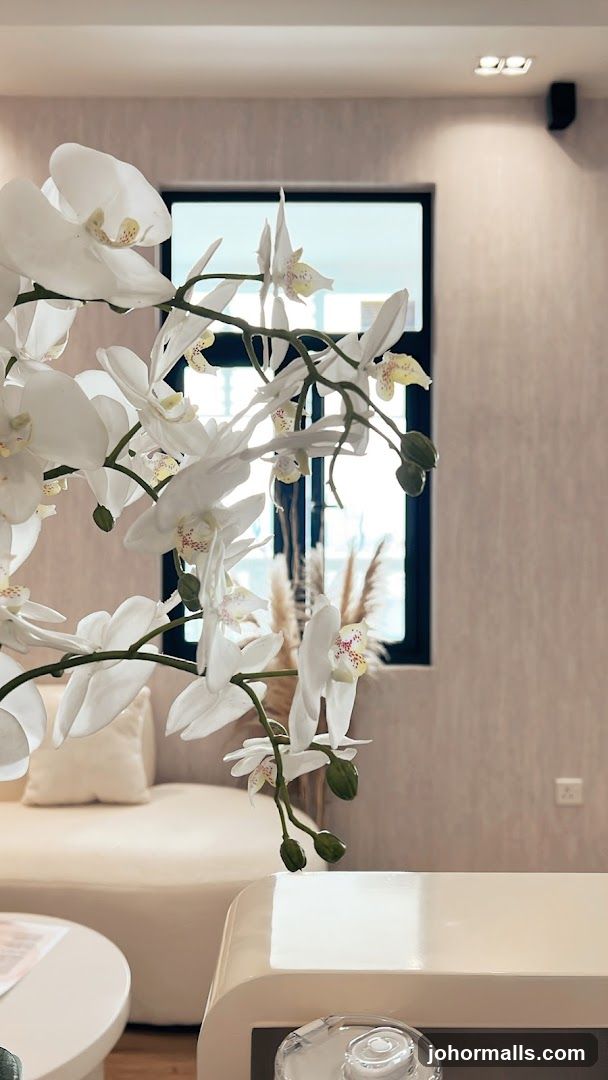 Interior with Orchids and Sofa