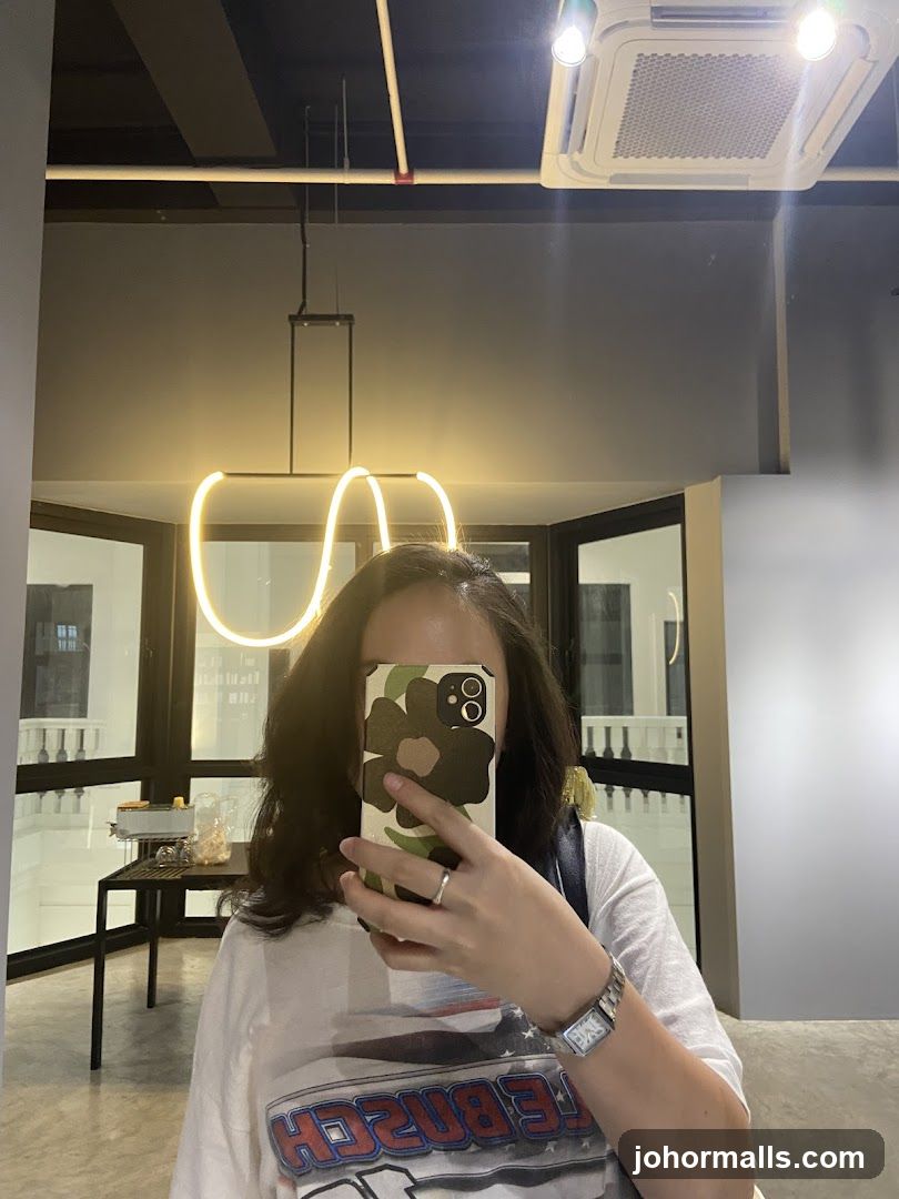 Woman taking a selfie in a modern interior