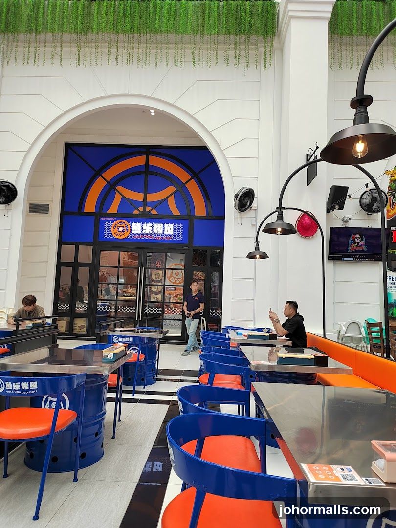 Restaurant Interior with Blue and Orange Seating