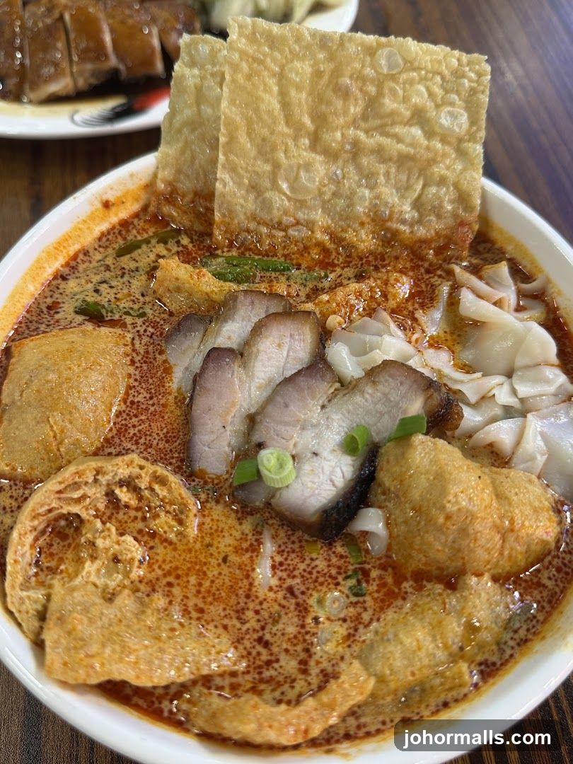 Curry Laksa with Pork Belly and Wontons