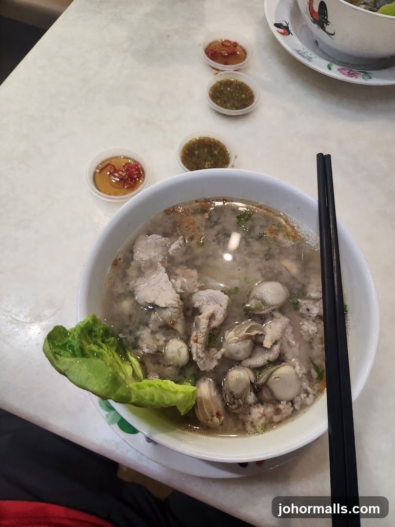 Bowl of Noodles with Oysters and Pork