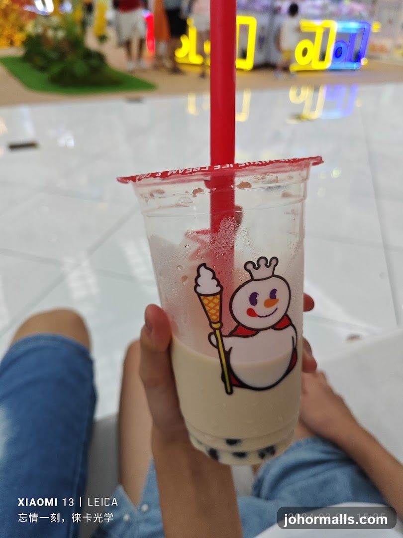 Person holding a bubble tea