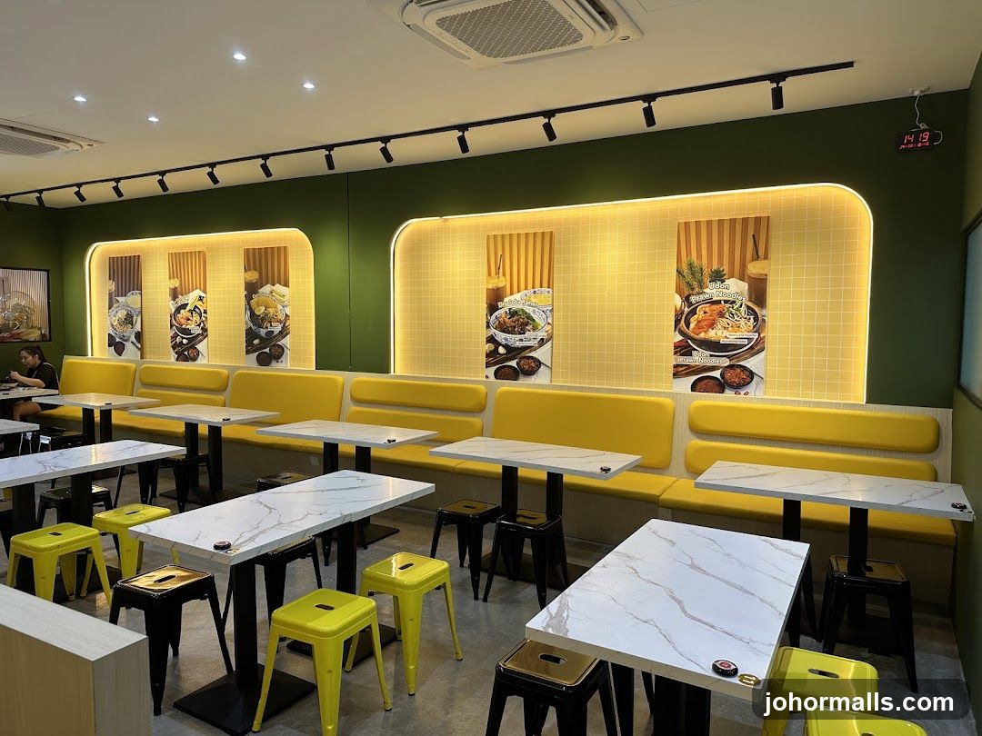 Restaurant Interior with Yellow Booths and Marble Tables