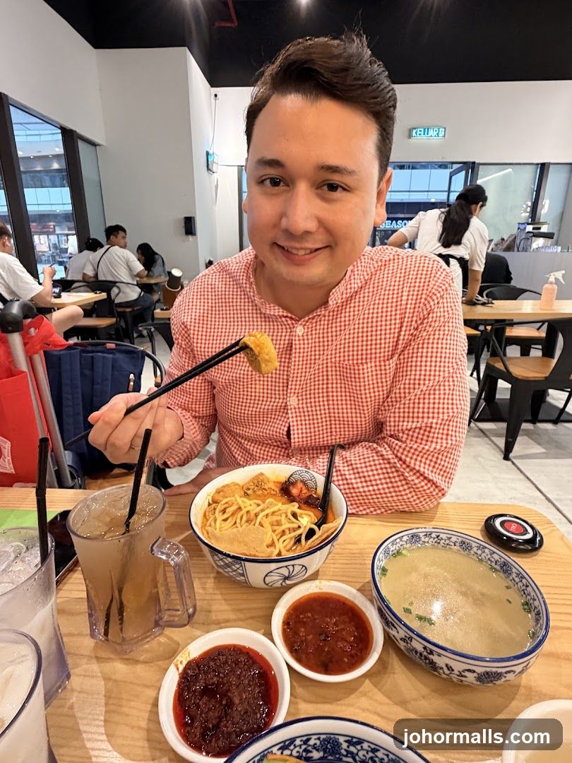 Man eating noodles