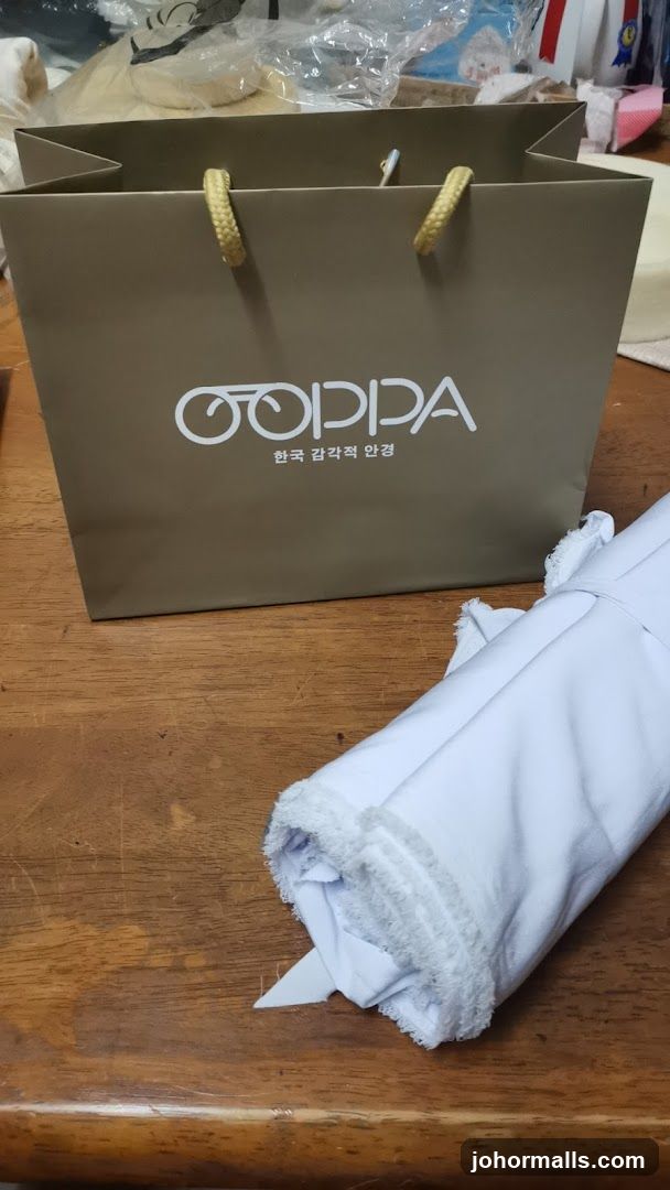 Shopping Bag and Rolled Fabric