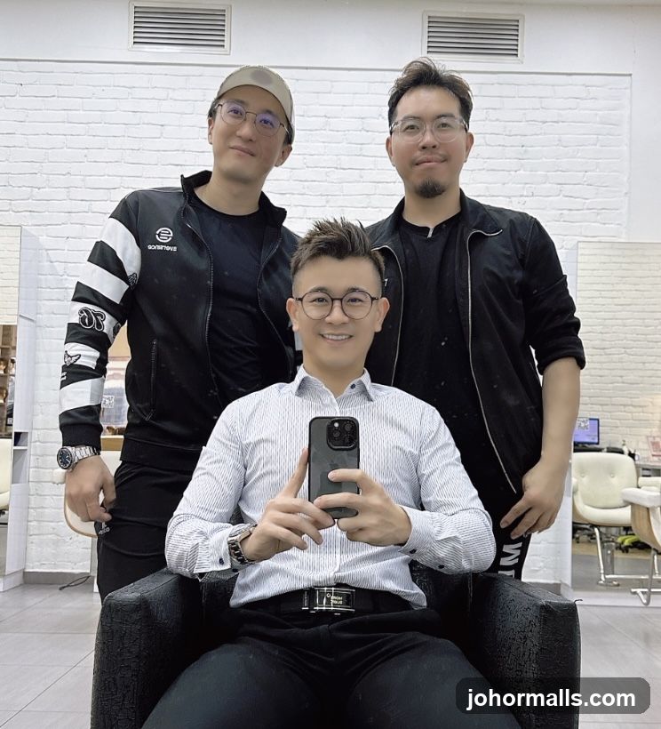 Three men posing for a selfie in a salon