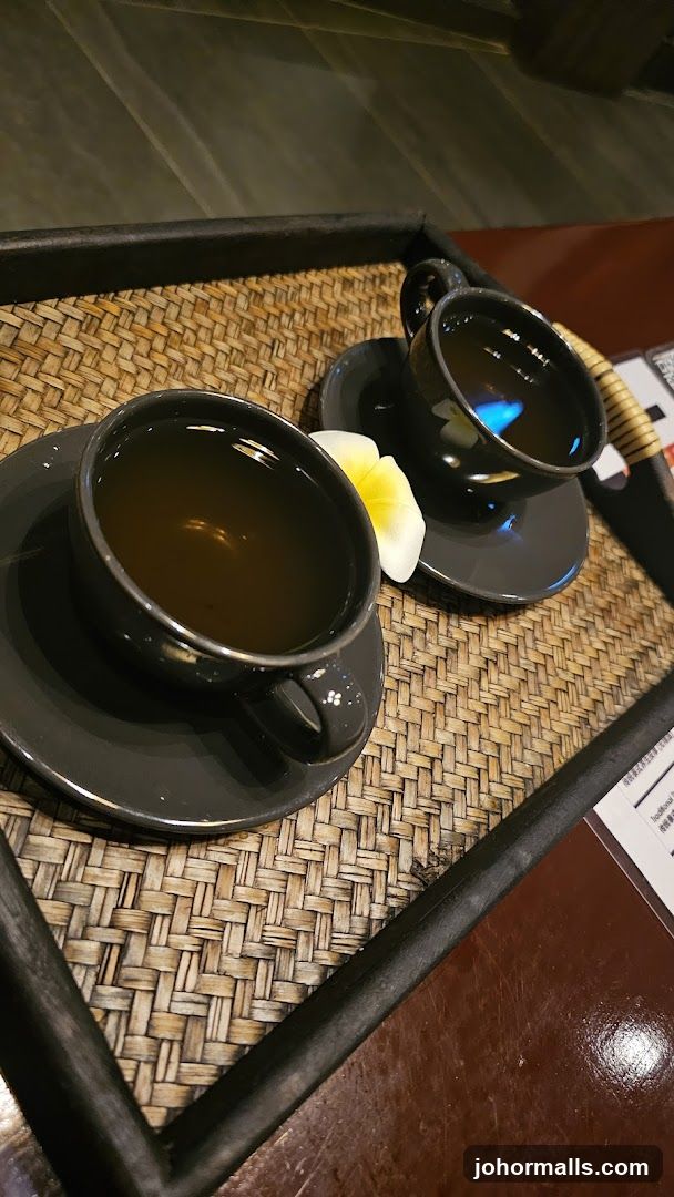 Two cups of tea on a tray