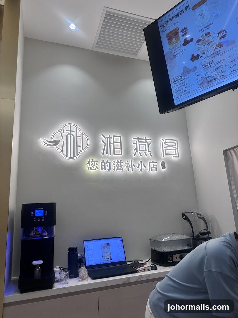 Interior of a shop with a menu board and signage