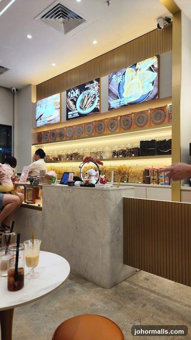 Interior of a shop with displayed goods and seating area