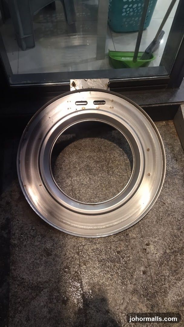Circular Metal Grate on Floor