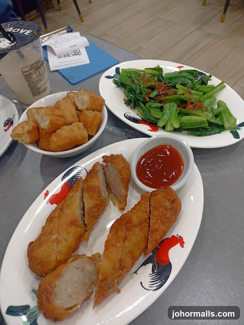 Fried Meat Rolls with Vegetables and Dough Sticks