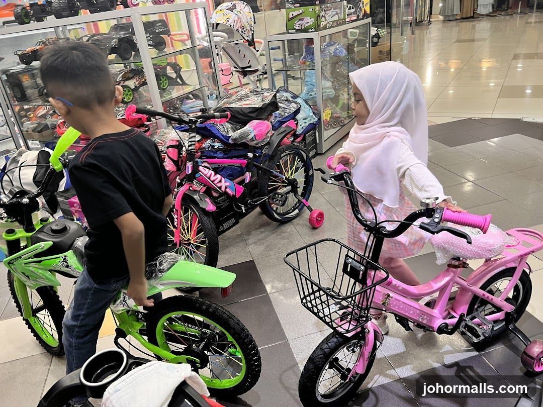 Children looking at bicycles in a store
