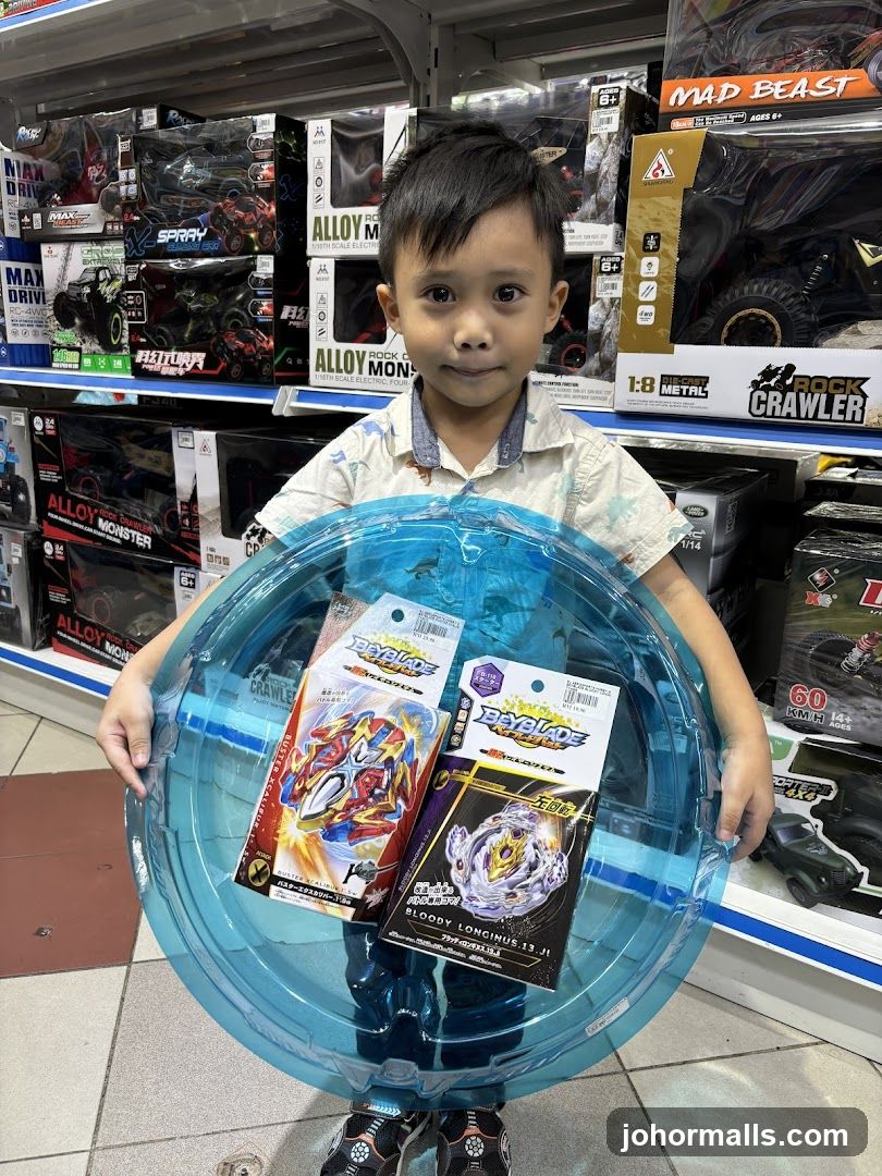 Boy Holding Beyblade Arena