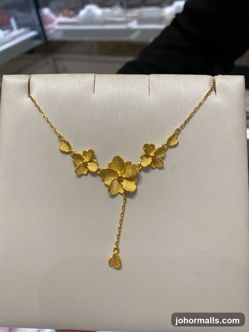 Gold Necklace with Flower Motifs