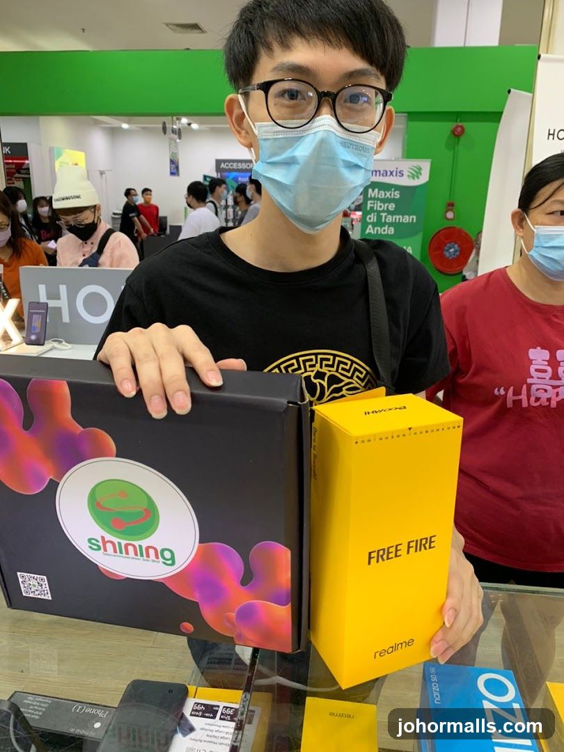 Man holding boxes in a store