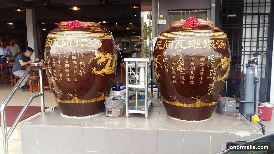 Large Ceramic Jars Outside Restaurant