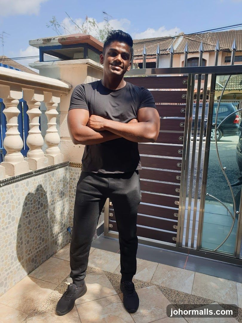 Man in black t-shirt and sweatpants