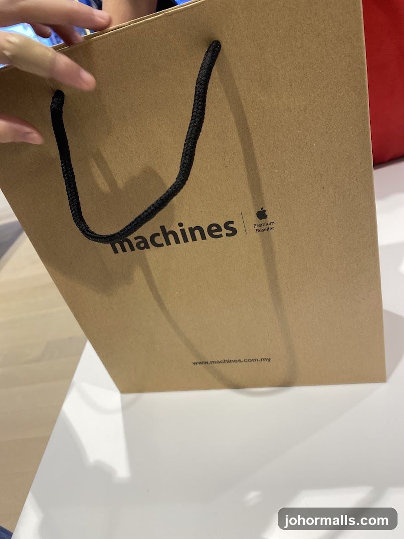 Brown paper shopping bag with logo