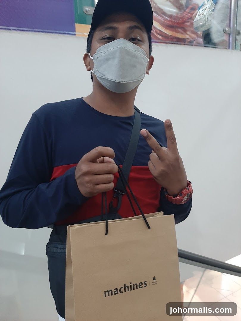 Person holding a shopping bag