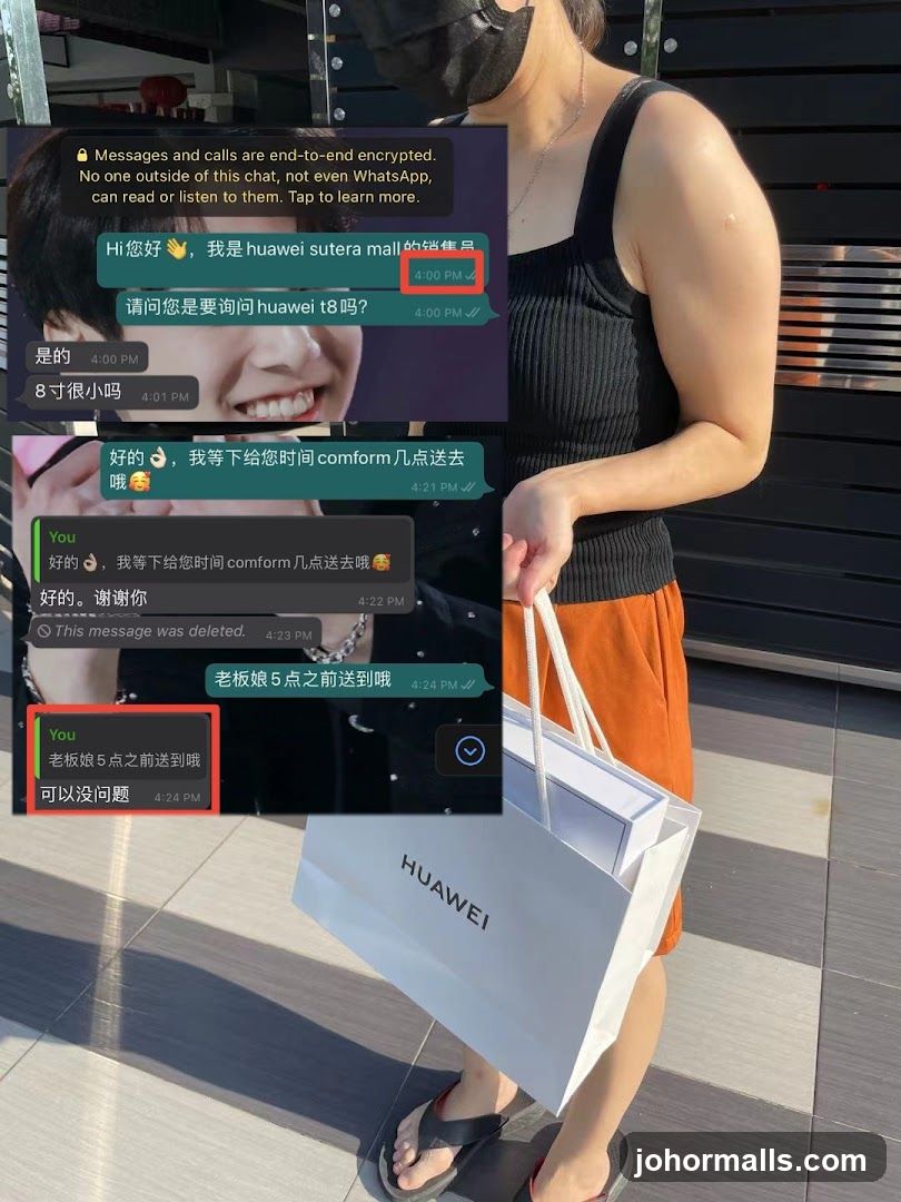 Person holding Huawei shopping bag