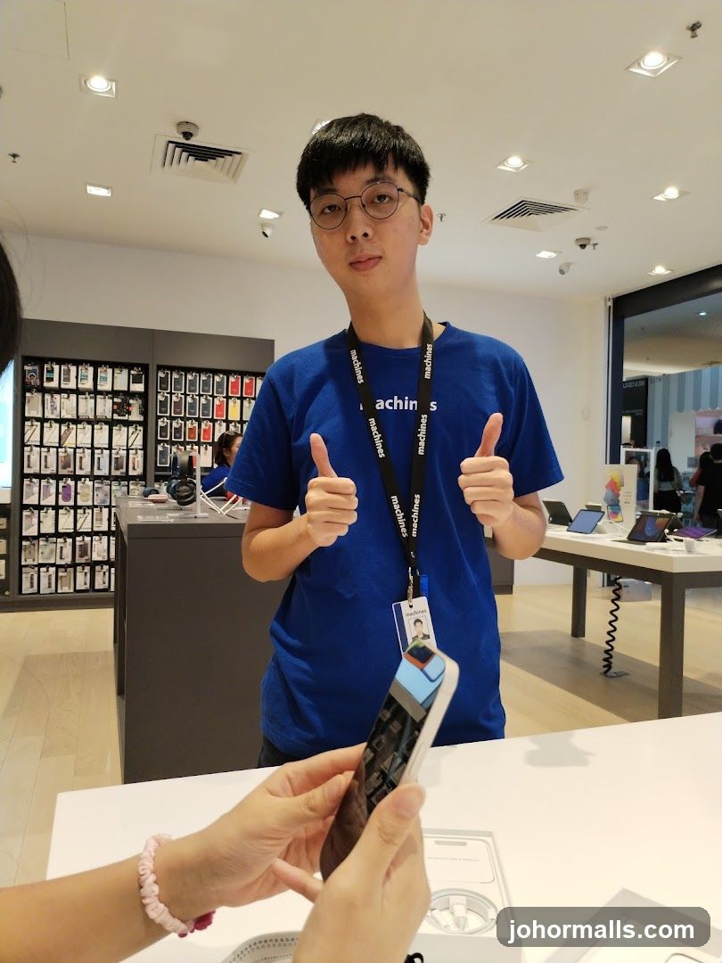 Store Employee Showing Phone