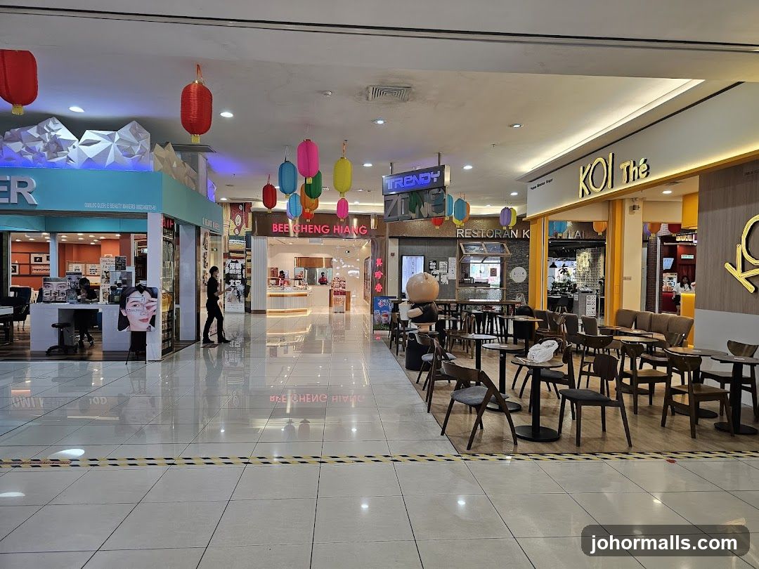 Mall Interior with Shops and Seating Area