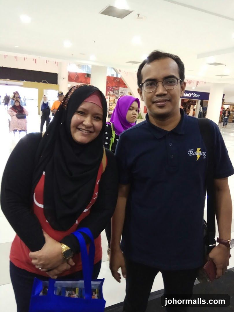 Two people posing for a photo